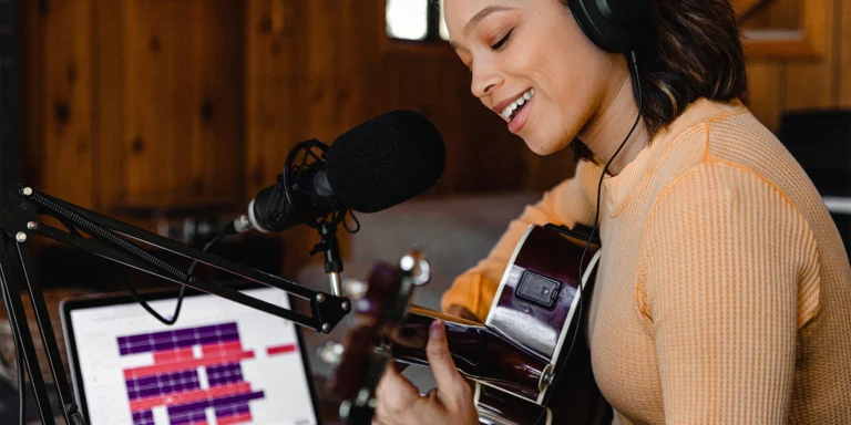 Musician Recording On A Laptop