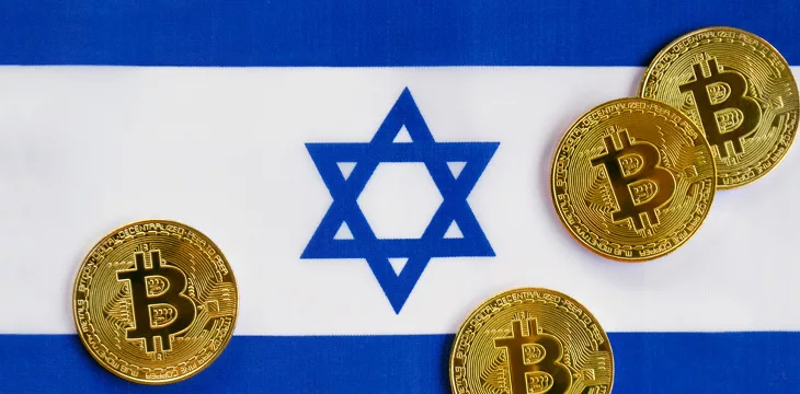 Bitcoin Cryptocurrency Physical Golden Bitcoins On An Israeli Flag